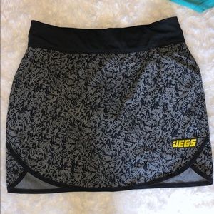 Grey Adidas golf or tennis skort